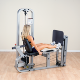 PCL leg press machine in use, showcasing a user performing leg exercises.
